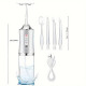Іригатор для чищення зубів та порожнини рота Oral Irrigator з акумулятором та змінними насадками White GJ-76