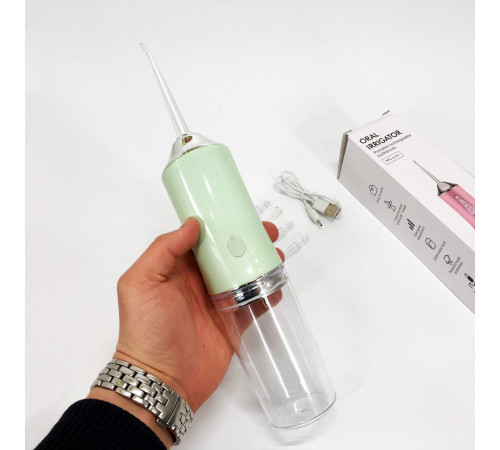 Ирригатор для чистки зубов и полости рта Oral Irrigator с аккумулятором и сменными насадками Green GF-63